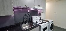 Affordable Ground-Level! Bright Living – All Utilities Includ - Photo 5