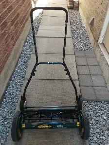 Manual lawnmower. The brand is Yardworks