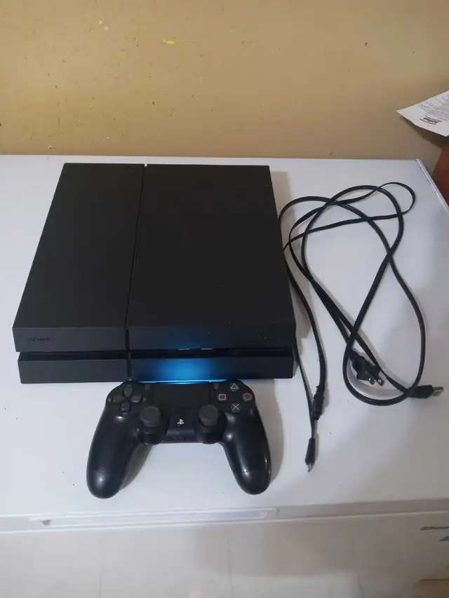 Console PS4 avec 1 manette 120$
