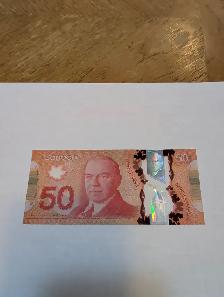 I have one Crisp Canadian $50,00 dollar Fancy Banknote for sell