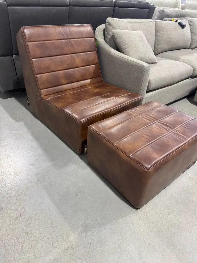 Brown foam lounge chair with ottoman