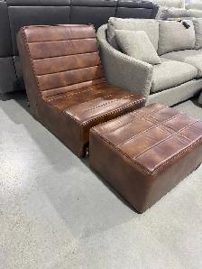 Brown foam lounge chair with ottoman