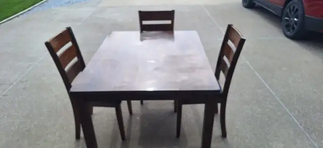Wood dining set with padded seats
