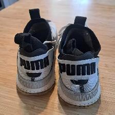 Men's Puma and Under Armour sports shoes