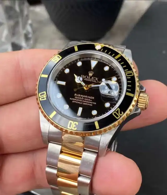 rolex submariner 1999 two tone black and gold