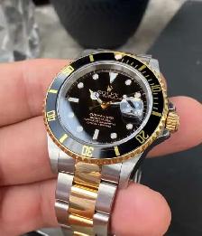rolex submariner 1999 two tone black and gold