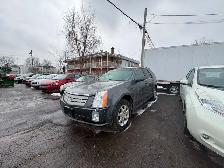Cadillac SRX 2008 aut. Cruir. toit. $4495. rusty 450-820-0550