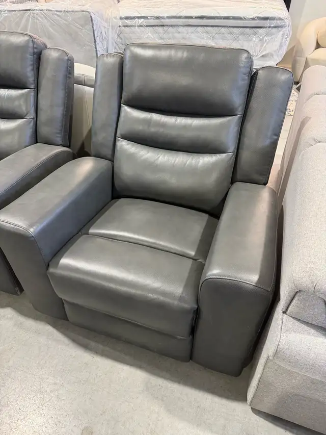 Grey leather glider manual recliner