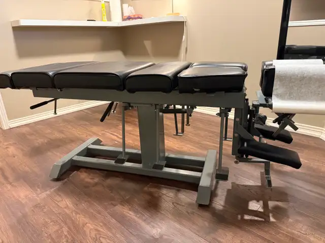 CHIROPRACTIC ADJUSTING TABLES