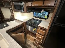 2017 Keystone Outback 332FK, FRONT KITCHEN & DINETTE SPACIOUS - Photo 24