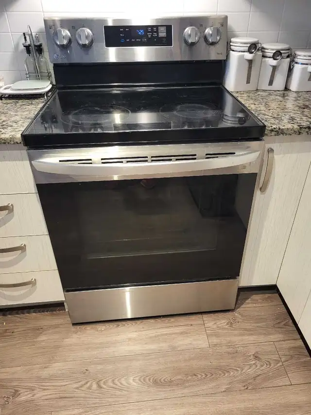 stove LG , good condition , the top not as new  after use  $300