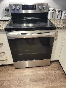 stove LG , good condition , the top not as new  after use  $300