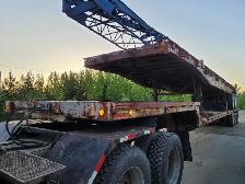 Old Tridem Step Deck Trailer - Photo 3