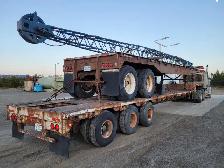 Old Tridem Step Deck Trailer - Photo 4