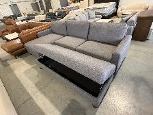 Grey fabric sectional with storage ottoman - Photo 2