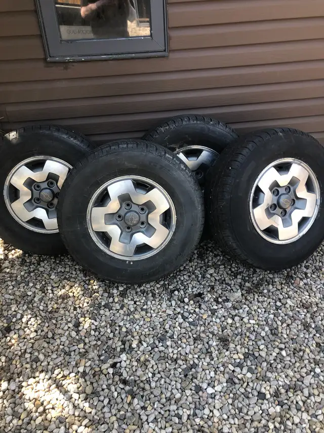 4 maxtour tires with rims 235/ 70R15 radials  with blazer rims