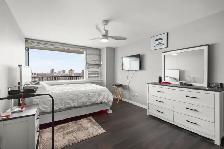 Bright & Open 800sqft Condo offering panoramic city views! - Photo 6