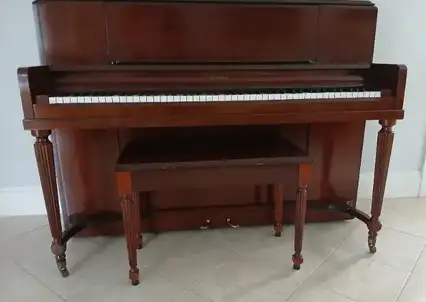 WTD:somebody(s) to lift a piano into a van