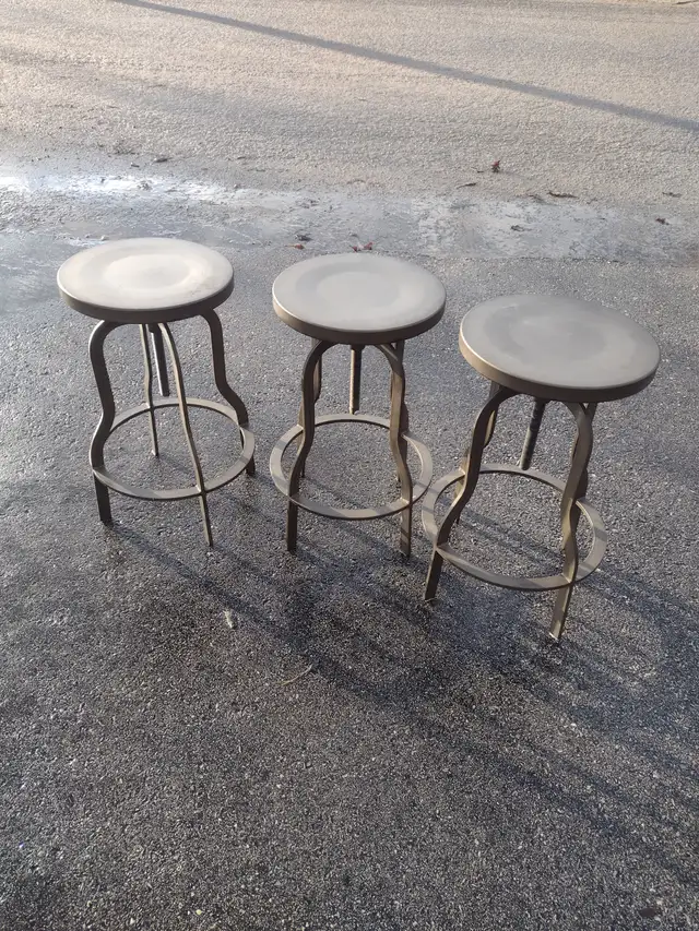 3 metal swivel stools