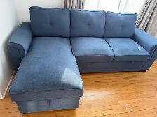 Sofa-lit sectionnel réversible  – Comme NEUF  (Laval)