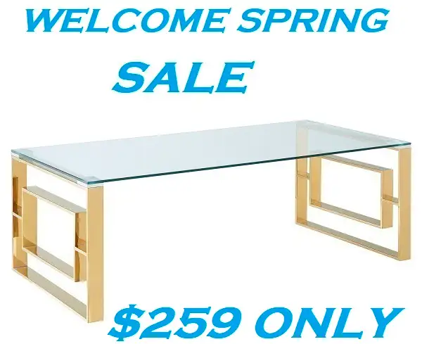 EROS COFFEE TABLE IN POLISHED GOLD AND THICK GLASS..