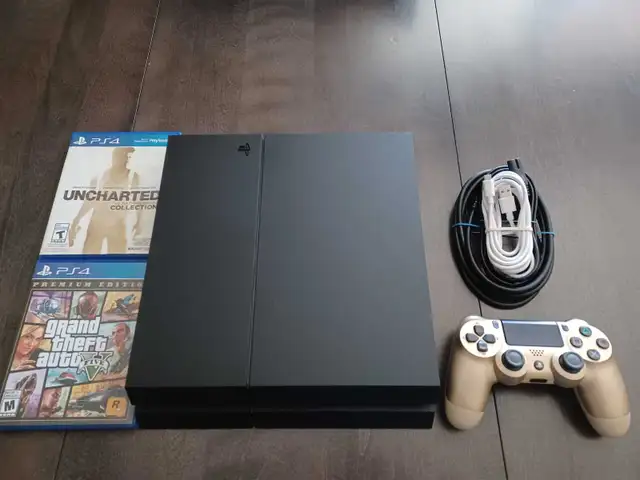 PS4   1 manette   2 jeux