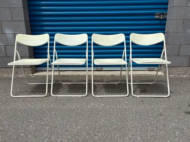 Four Folding Chairs