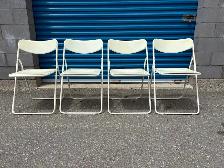 Four Folding Chairs
