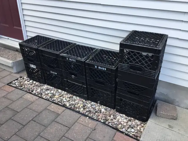 11 Plastic Milk Crates $5 Each