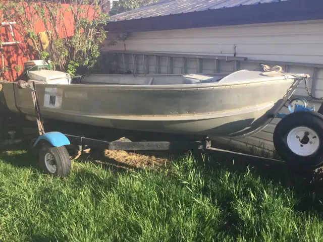 12’ Boat, trailer, motor, cruiseaday