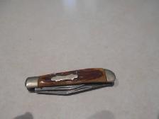 1-CANIF DE POCHE,STAINLESS STEEL 2 LAMES,RECOUVERT DE PLAST BRUN