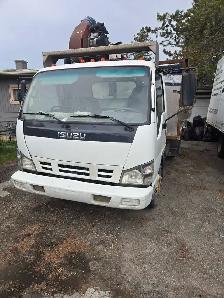 2006 ISUZU dump truck with vac unit.