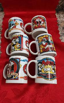 Popeye and Holly Hobbie mug sets for sale