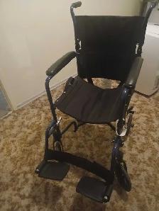 Transport wheelchair