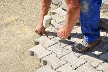 Concrete repairs and pavers installed - Photo 6