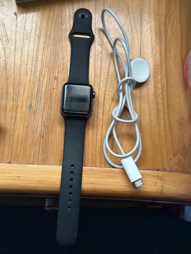 Apple Watch Series 3 with charger