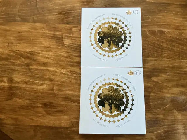 2. 2014 "WAIT FOR ME DADDY" Uncirculated TOONIE !