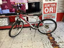 vélo rouge et argent super cycle