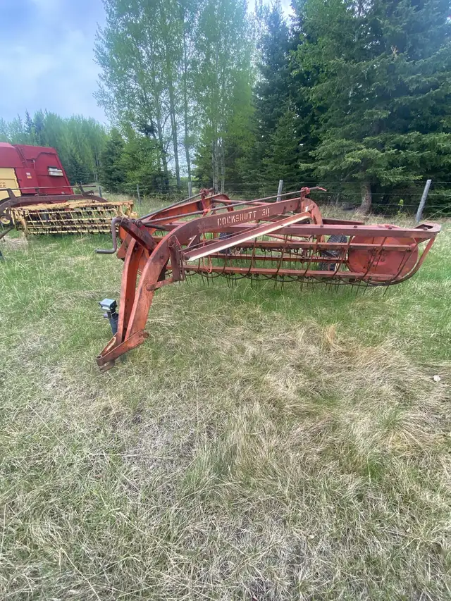 Hay rake side delivery