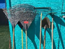 Assorted garden tools, snow shovels