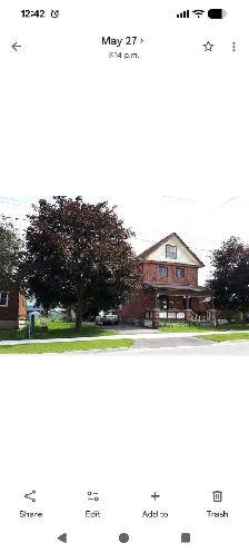 FURNISHED ROOM FOR RENT TO A 60  WOMAN ONLY.  JULY 1