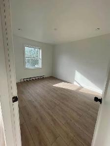 À LOUER – Appartement rénové de 4 chambres sur 2 niveaux - Photo 4