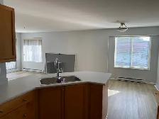 Bright 2 bedroom Corner Condo in Quiet Adult Oriented Building - Photo 2