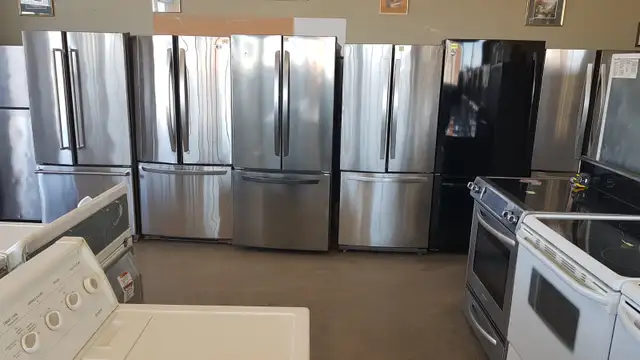 Refrigerateur-Laveuse-Secheuse-Cuisiniere