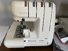 SEWING MACHINE AND SERGER FLOOR MODEL SALE - Photo 4
