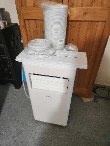 NEW 4 IN 1 (10 000)BTU AC,  DEHUMIDIFIER, HEATER, FAN, HOSE - Photo 2
