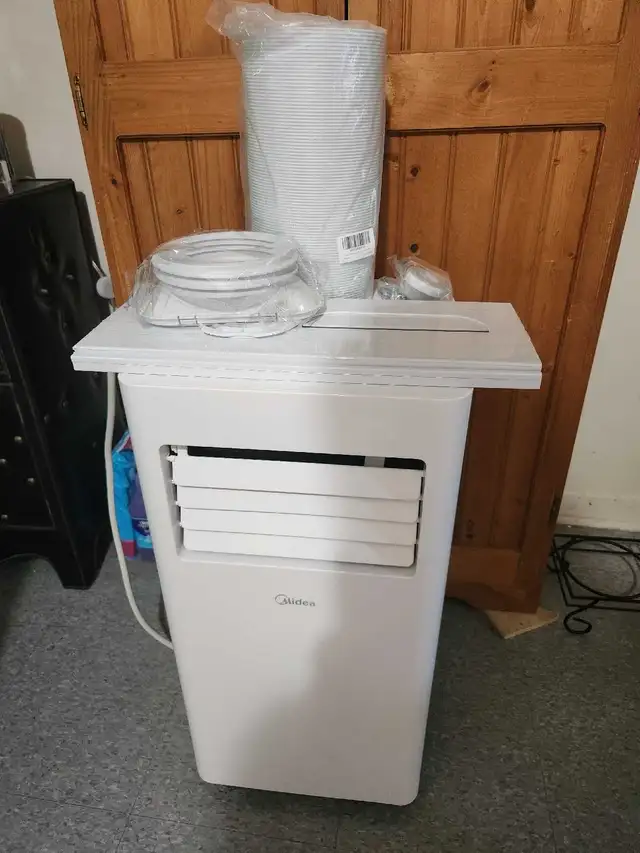 NEW 4 IN 1 (10 000)BTU AC,  DEHUMIDIFIER,  HEATER,  FAN,  HOSE