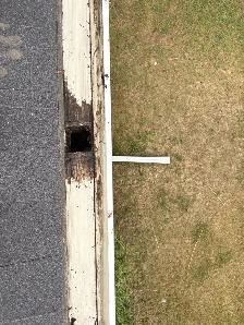 Clogged Gutter Cleaning - Photo 6
