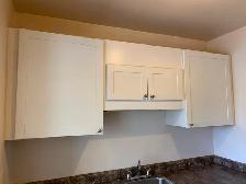 Lower and upper kitchen cabinets - Photo 3