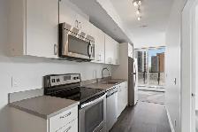 End Unit Condo Available TODAY! Gym, rooftop Patio! - Photo 3